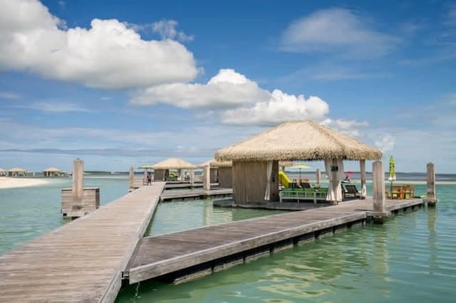 Luxury beach cabana at Coco Cay with turquoise Caribbean water