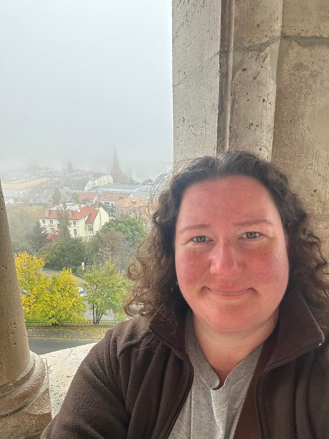 Stacy Hodgson atop a hill overlooking Budapest, Hungary