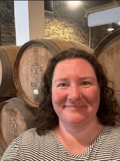 Stacy Hodgson sampling wine in the Douro Valley wine cellars during a river cruise