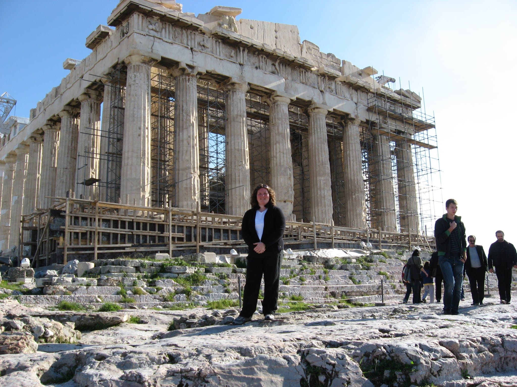 Stacy Hodgson standing before the Parthenon on the Acropolis in Athens, Greece