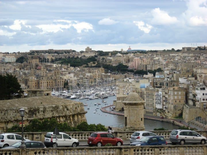 Historic harbor of Valletta, Malta with classic European architecture and sailboats